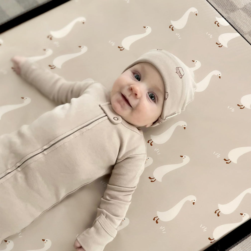 GRSSDER machine-washable mini crib sheet ready for easy cleaning.