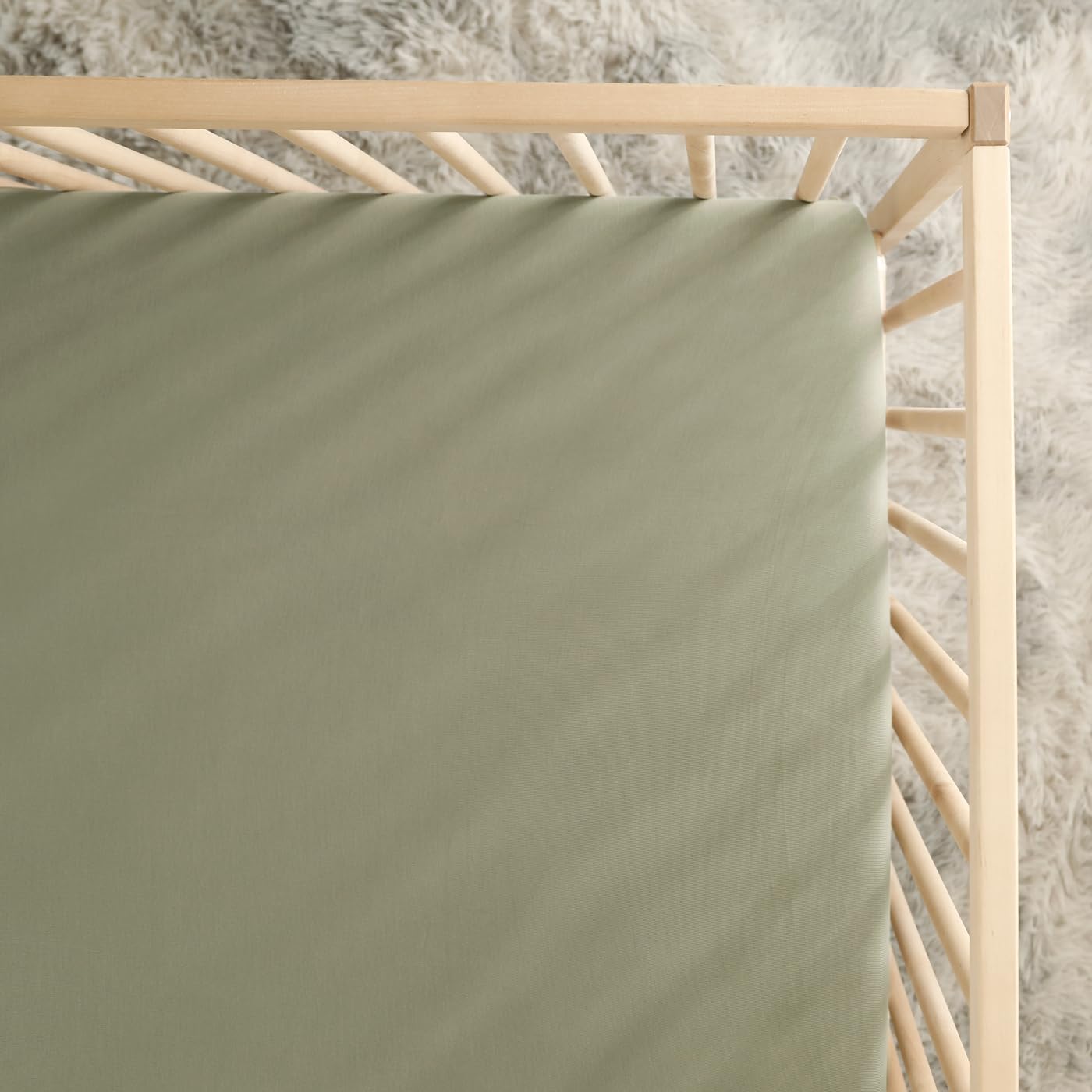 GRSSDER mini crib sheet with elastic band providing snug hold on standard pack n play mattresses