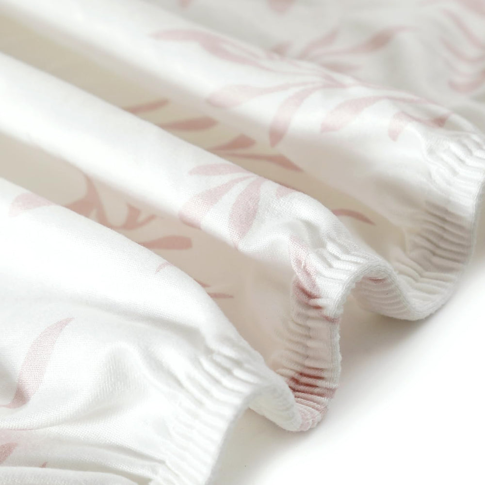 GRSSDER Moms-designed pattern brings beauty to nursery bedding.