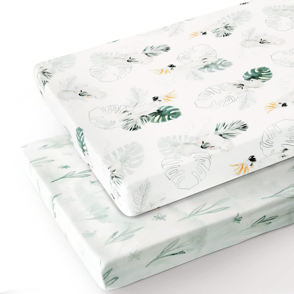 GRSSDER stretch jersey knit sheets securely fit portable cribs via elastic edges.