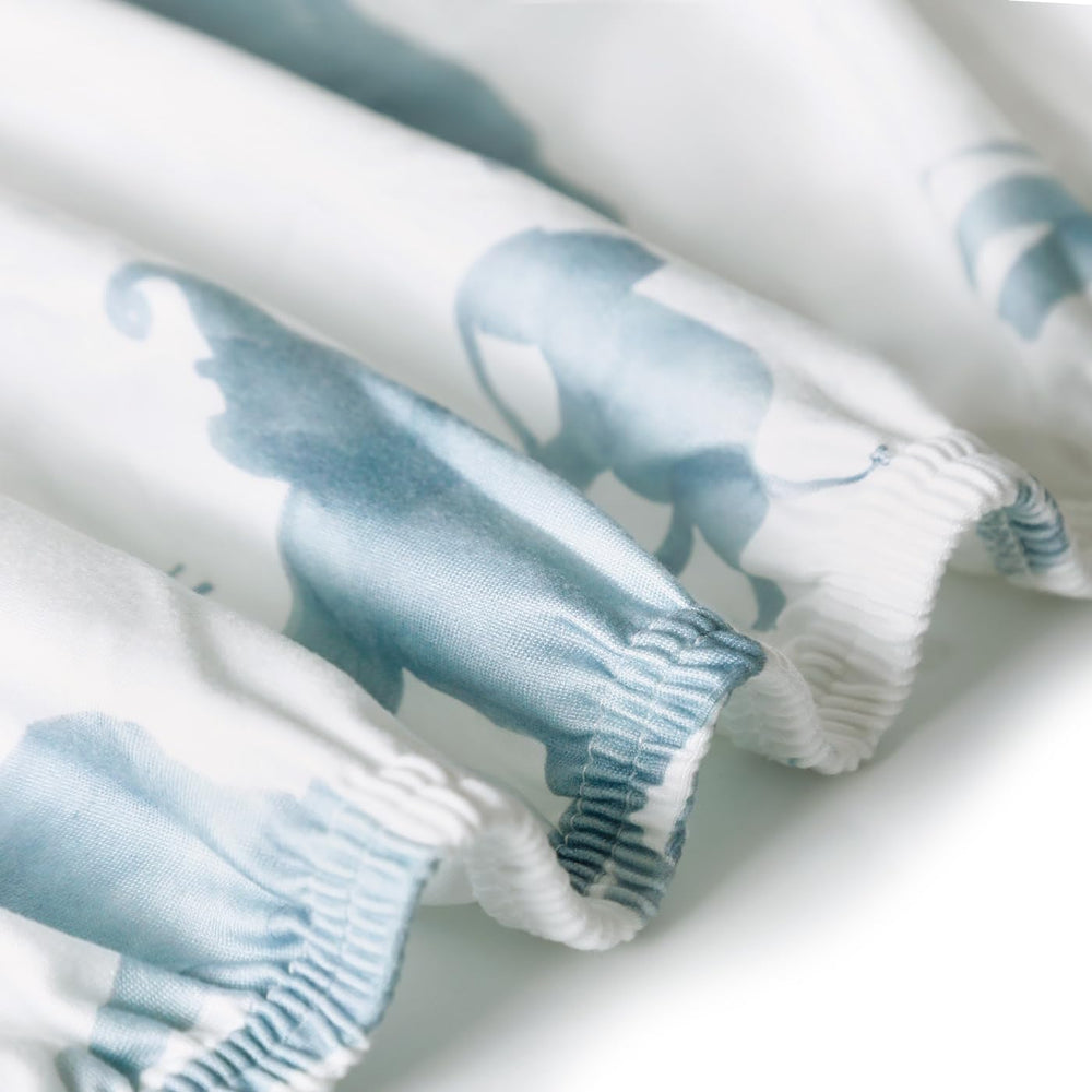 GRSSDER pattern close-up highlights the cheerful nursery design.