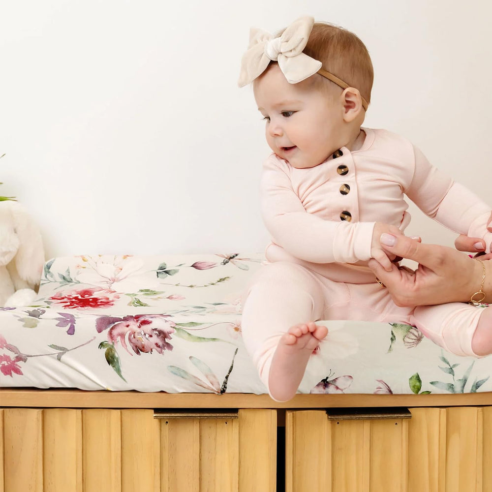 GRSSDER Pretty flowers and insects pattern adds charming nursery style.