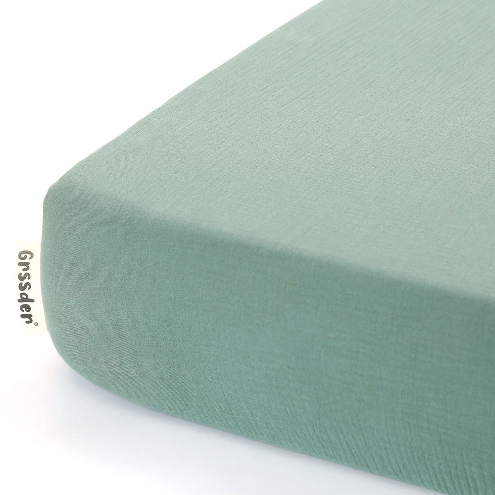 GRSSDER soft-muslin-crib-sheet-52x28-fit fits standard cribs snugly for a safe sleep surface.