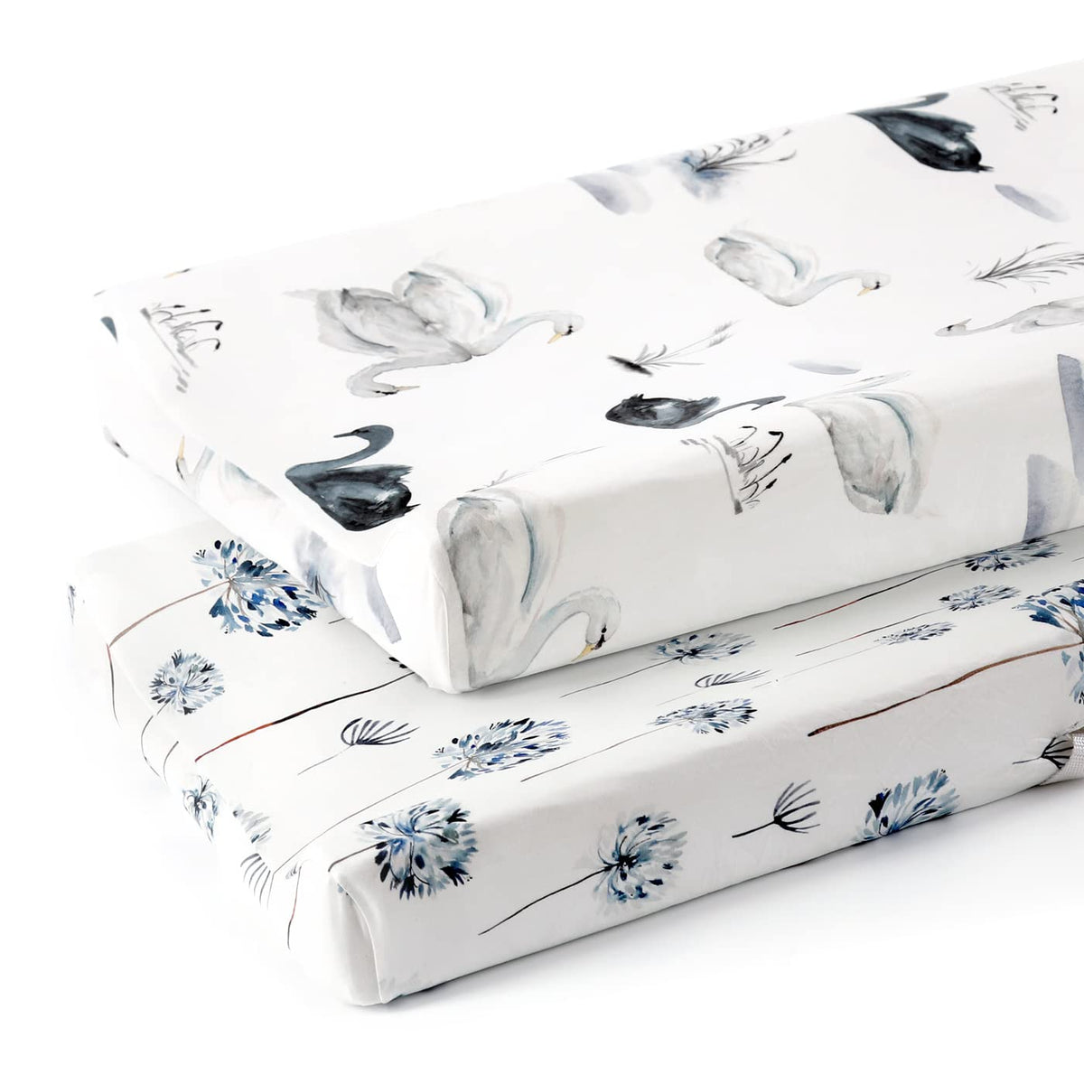 GRSSDER changing pad cover in Swan pattern offers snug, breathable comfort.