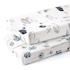 GRSSDER changing pad cover in Swan pattern offers snug, breathable comfort.