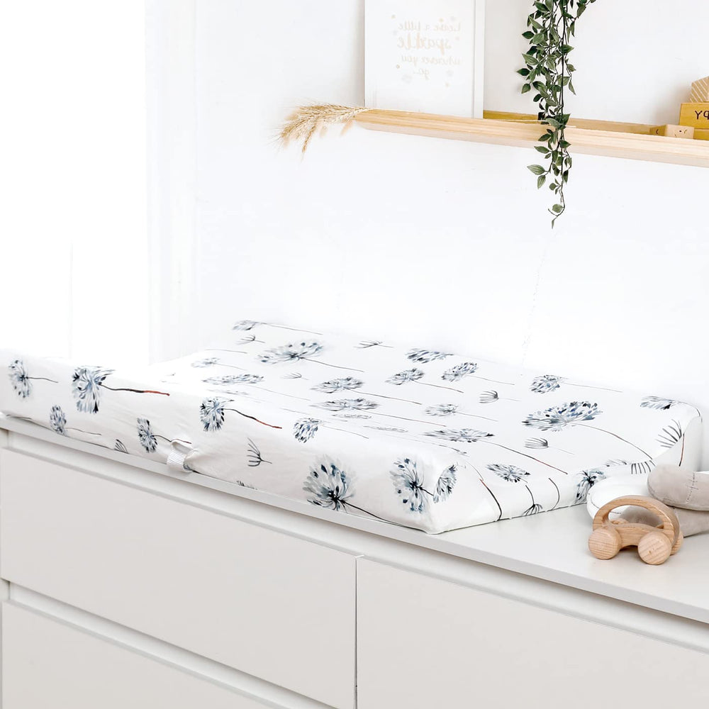 GRSSDER changing pad cover in Watercolor Dandelion pattern adds cozy nursery decor.