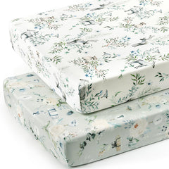 GRSSDER crib sheet on mattress showing universal fit with elastic edge.