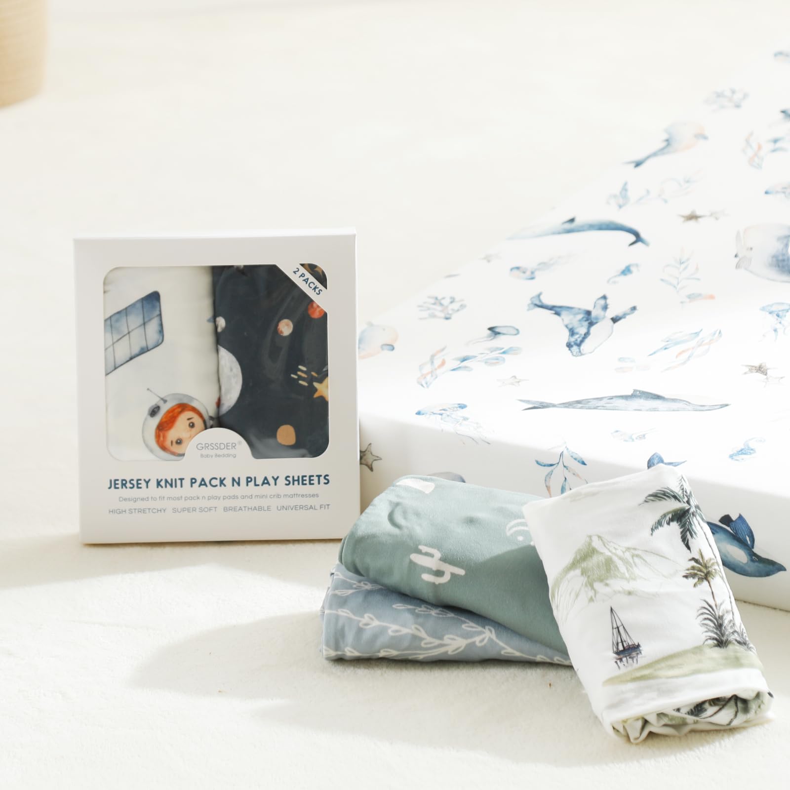 GRSSDER space print crib sheets create a calm, coordinated nursery look.
