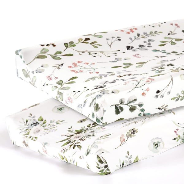 GRSSDER watercolor rose cover on a 32x16 changing pad, snug and stylish.
