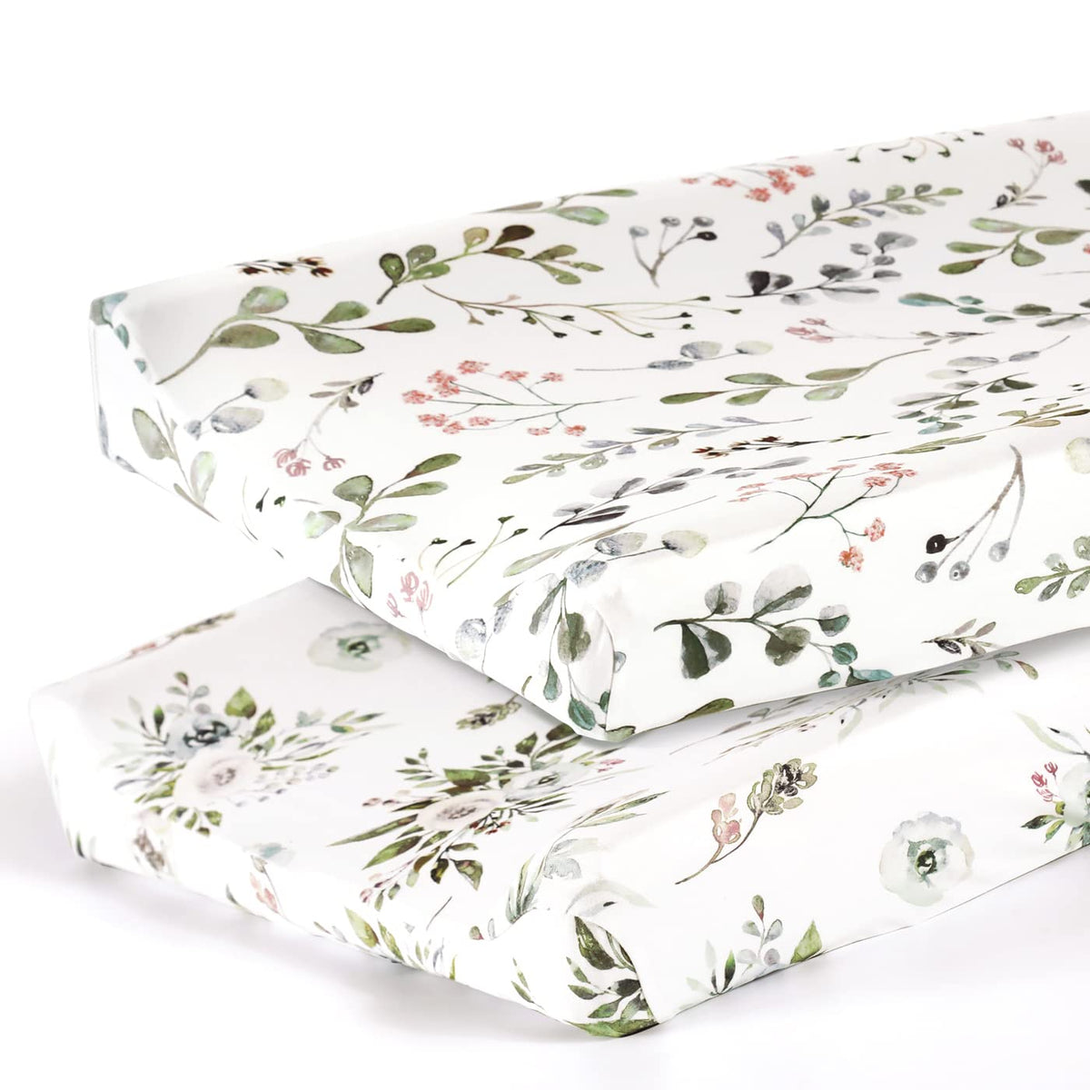 GRSSDER watercolor rose cover on a 32x16 changing pad, snug and stylish.