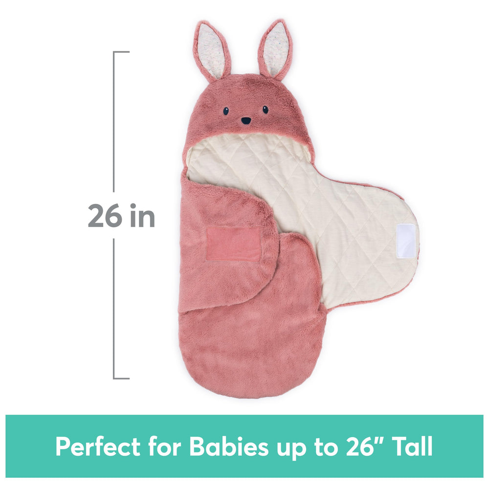 GUND Pink Bunny Blanket Wrap on bed scene conveys soothing nursery decor.