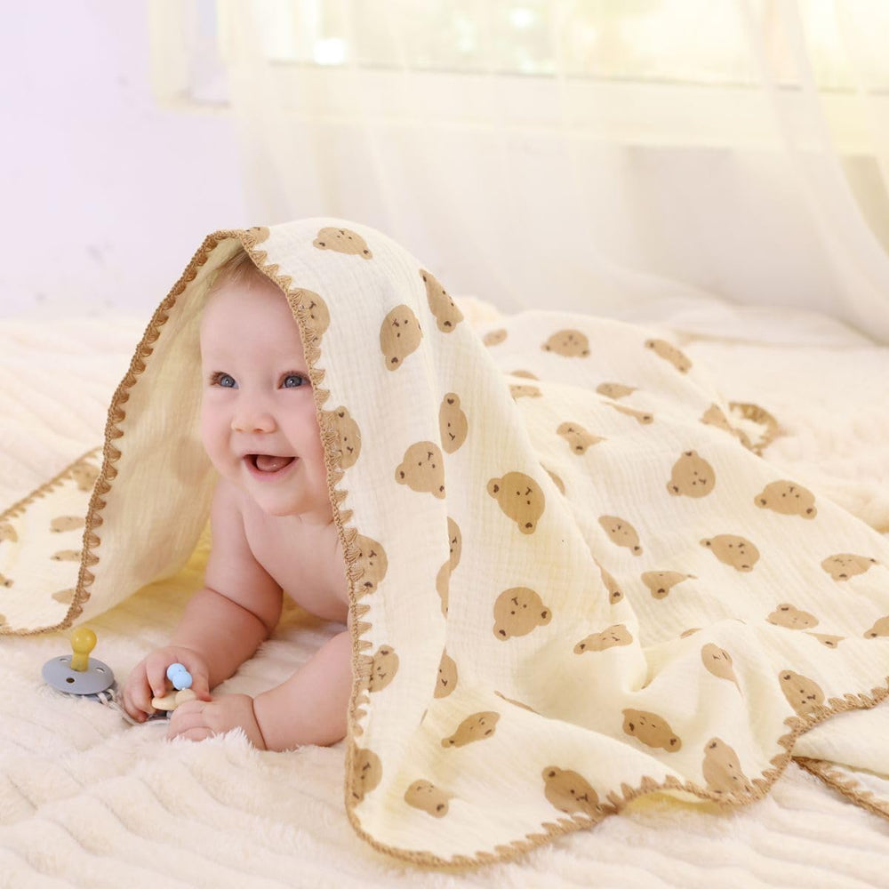 Gunnaicat double-layer muslin blanket provides cozy support for tummy time and travel.