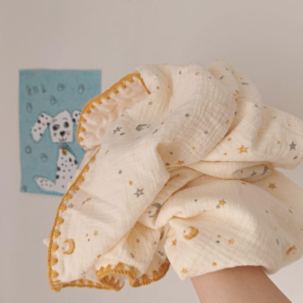 Gunnaicat muslin blanket used for stroller outings, easy to wash on the go.