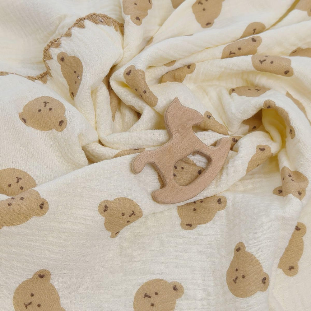 Gunnaicat ultra-soft muslin blanket offers breathable warmth for naps.
