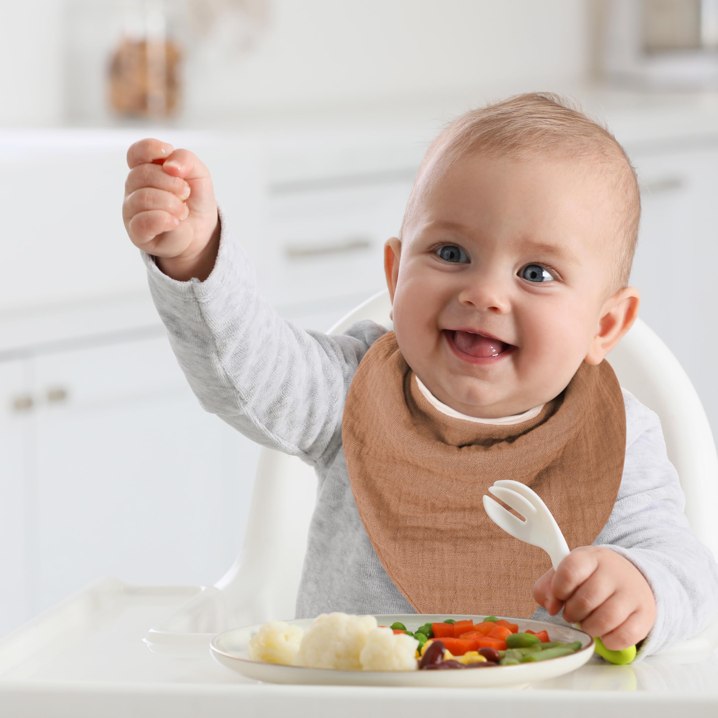 GUNTAIL adjustable closure bandana bib demonstrated on infant neck