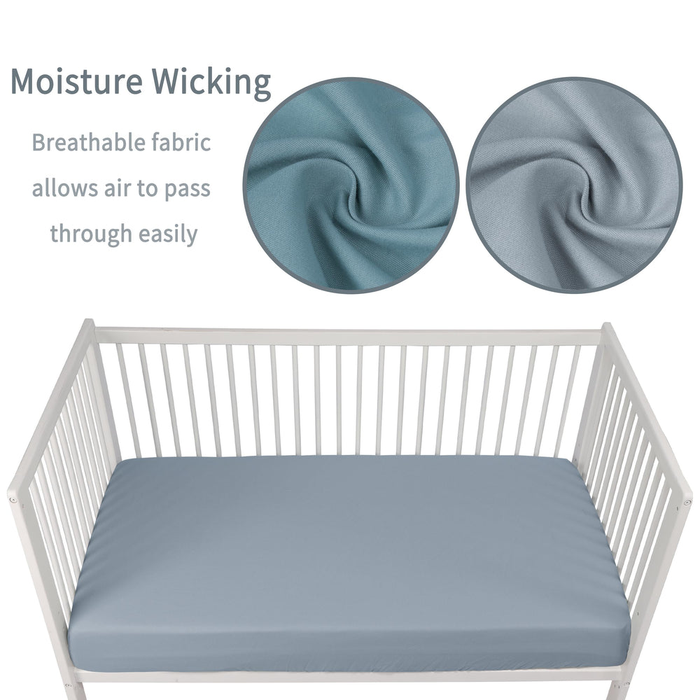 GUNTAIL two-pack fitted crib sheets show secure elastic edge for safe sleep