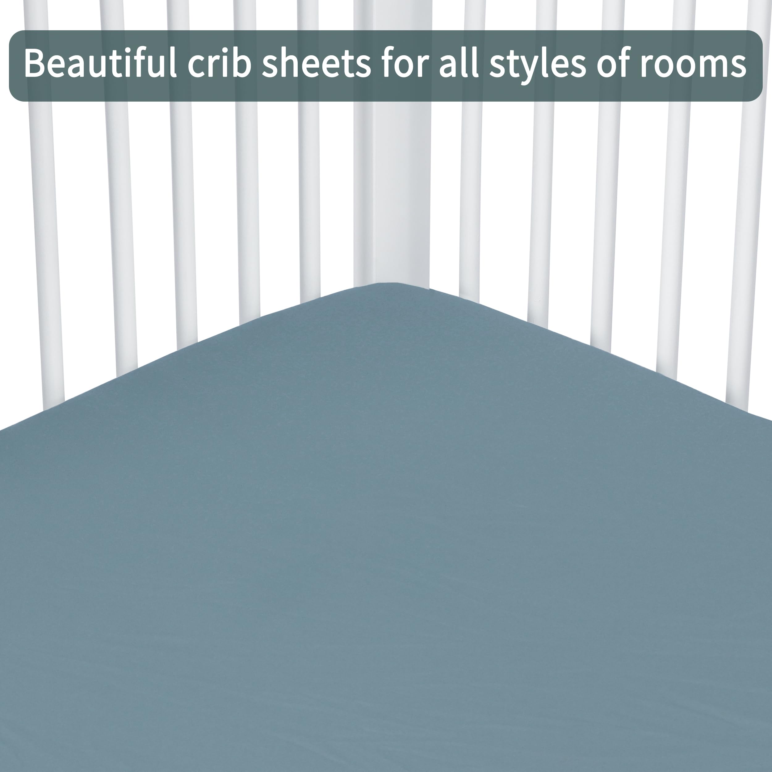 GUNTAIL dark-green and dark-grey crib sheets complement modern nursery decor