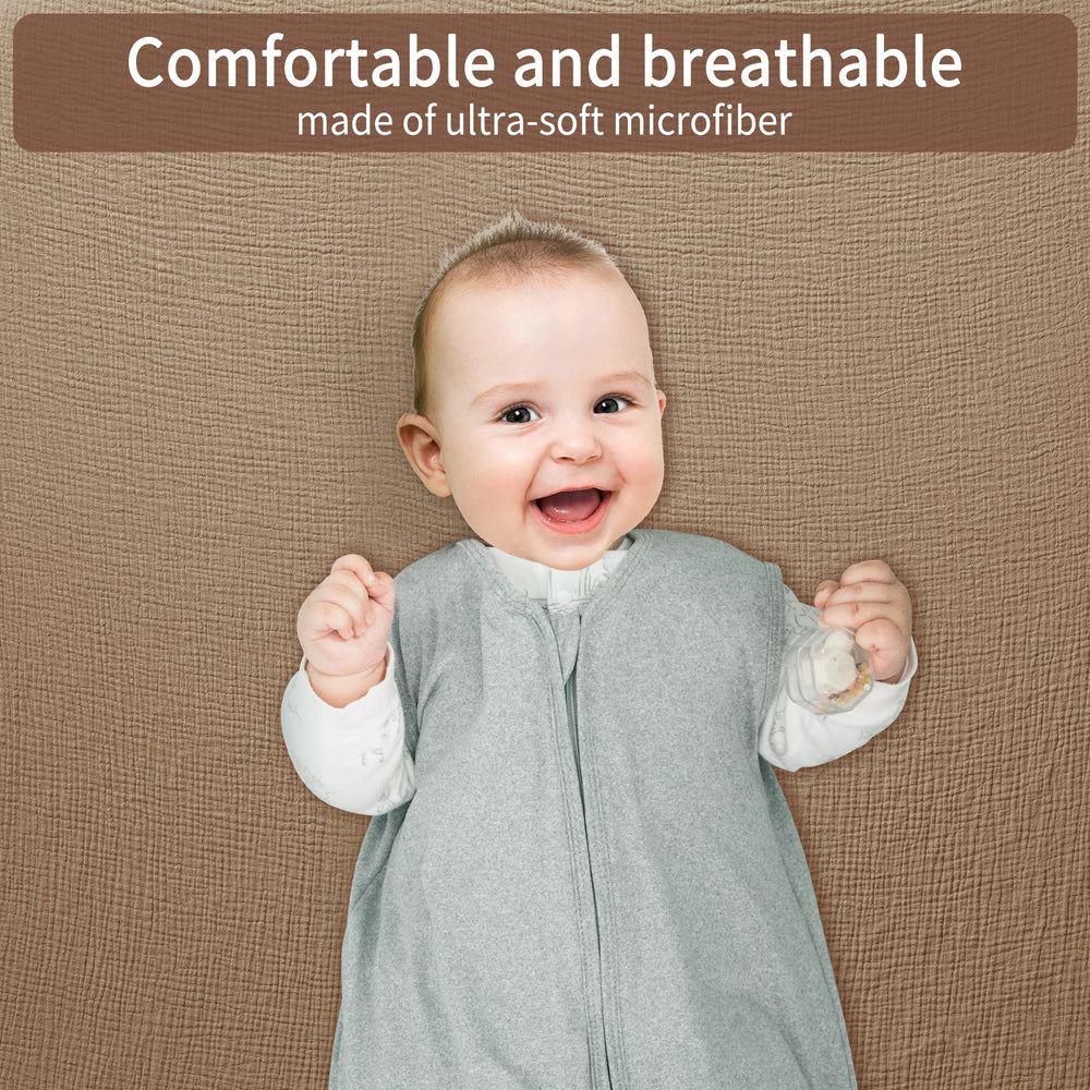 GUNTAIL muslin crib sheet coffee color two-pack demonstrates snug fit and easy care