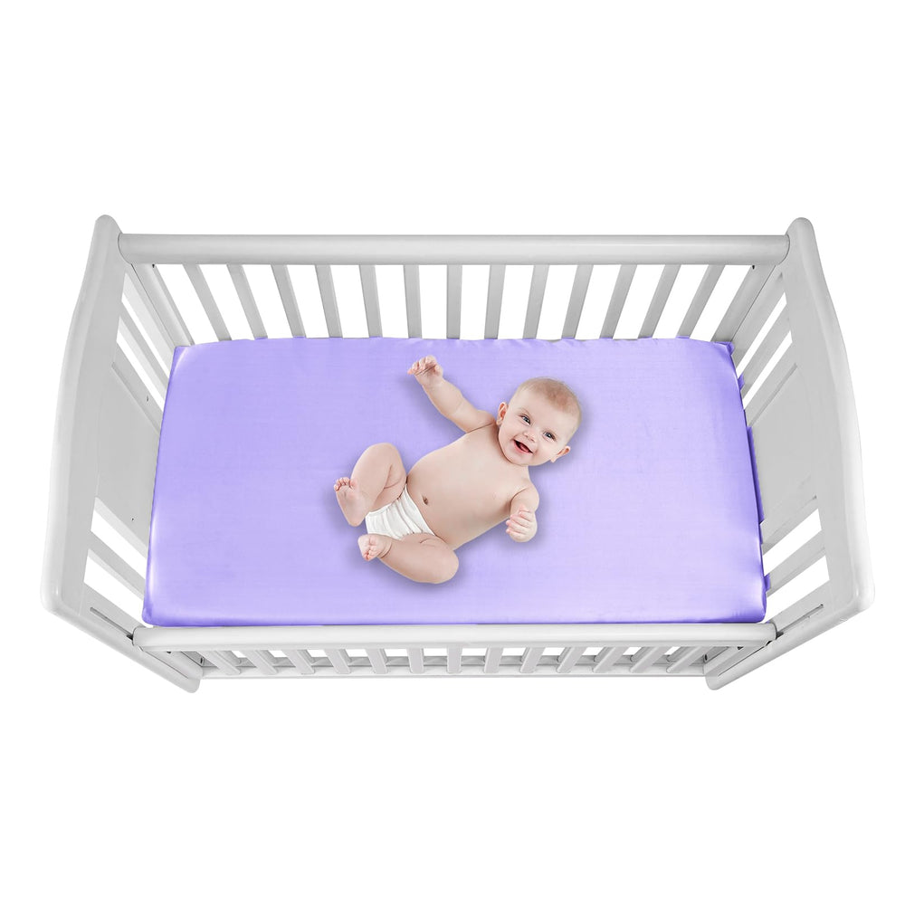 GUNTAIL satin crib sheet violet on mattress offers breathable comfort