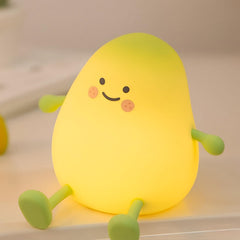 Gusweet Mango Night Light in yellow, front view, soft glow ideal for bedtime and viewing on the phone.