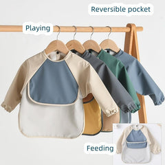 GZMM long-sleeve bib worn by toddler during meals and crafts.
