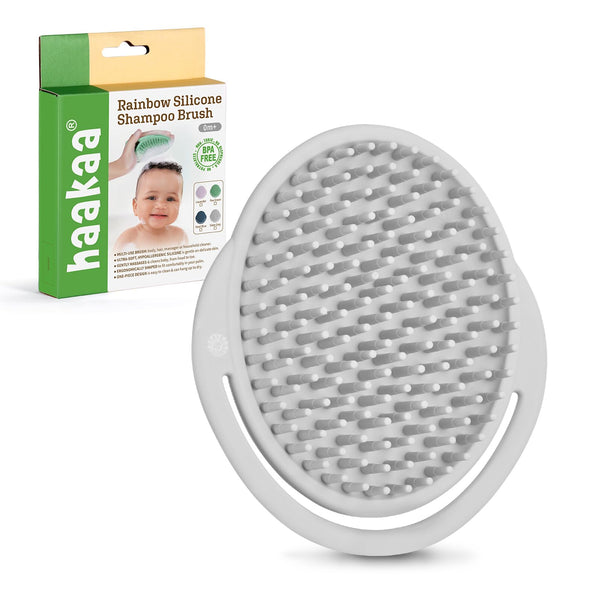 Haakaa Baby Cradle Cap Brush with soft bristles for gentle cradle cap care.
