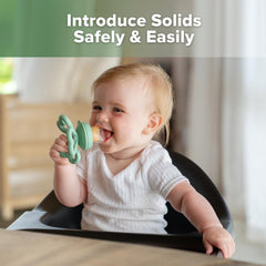 Haakaa Clover popsicle mold demonstrating frozen snacks for teething relief.