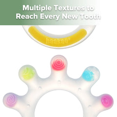 Haakaa Dinky Digits teether with a large palm grip for easy handling.