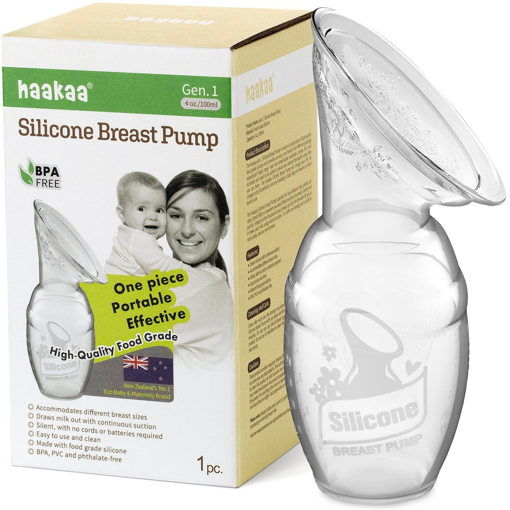 Haakaa manual breast pump in clear silicone for hands-free milk capture.