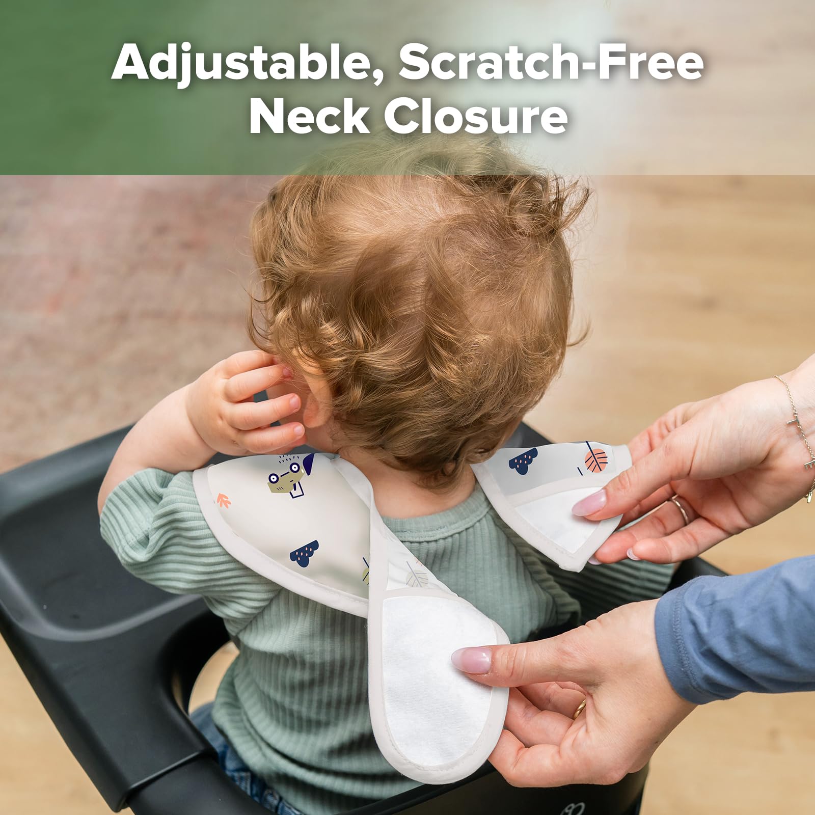 haakaa Mess Proof Baby Bib adjustable-neck ensures gentle, secure fit as babies grow.