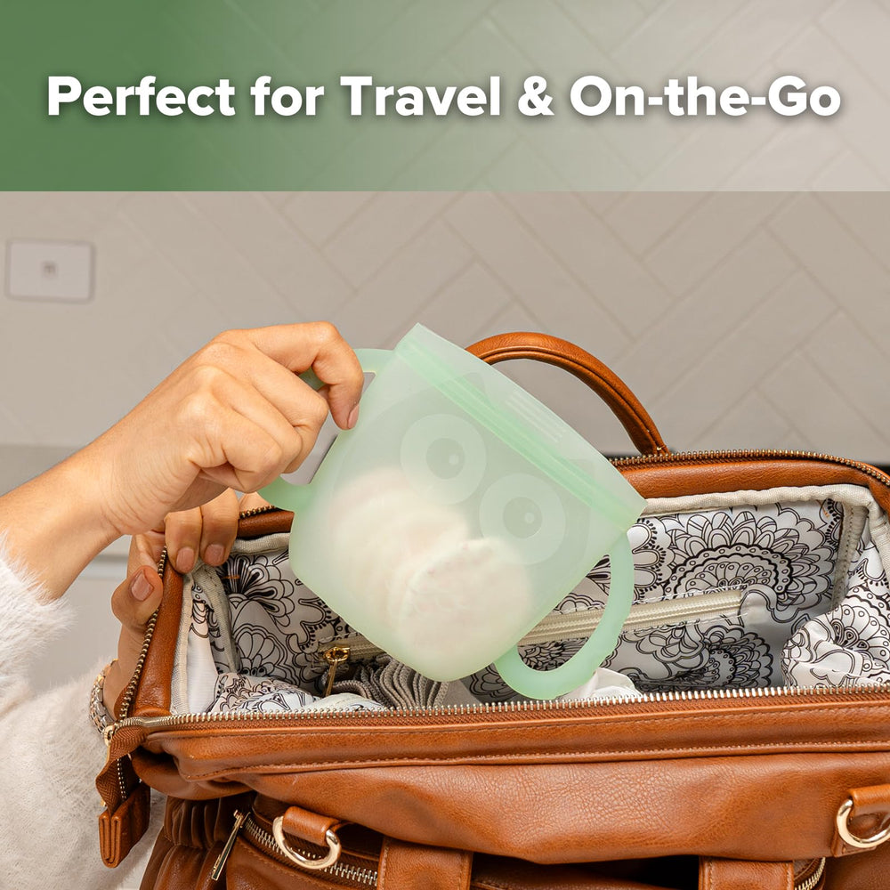 Dishwasher-safe Haakaa Oscar Owl container shown for easy cleanup after meals.