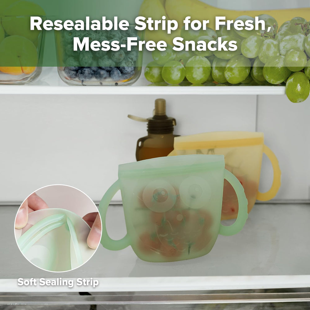 Lightweight Haakaa Oscar Owl toddler snack holder ideal for strollers and car rides.