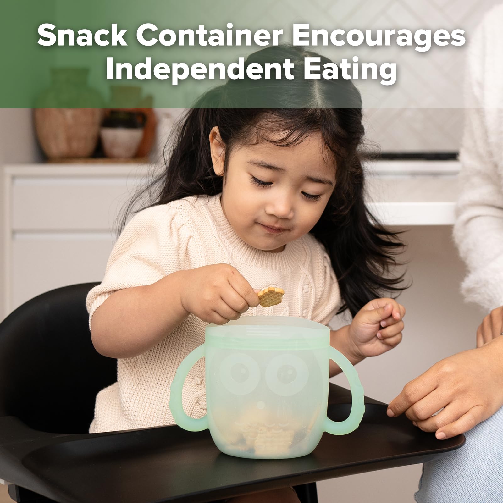 Haakaa Oscar Owl travel snack pouch compact design for on-the-go feeding.