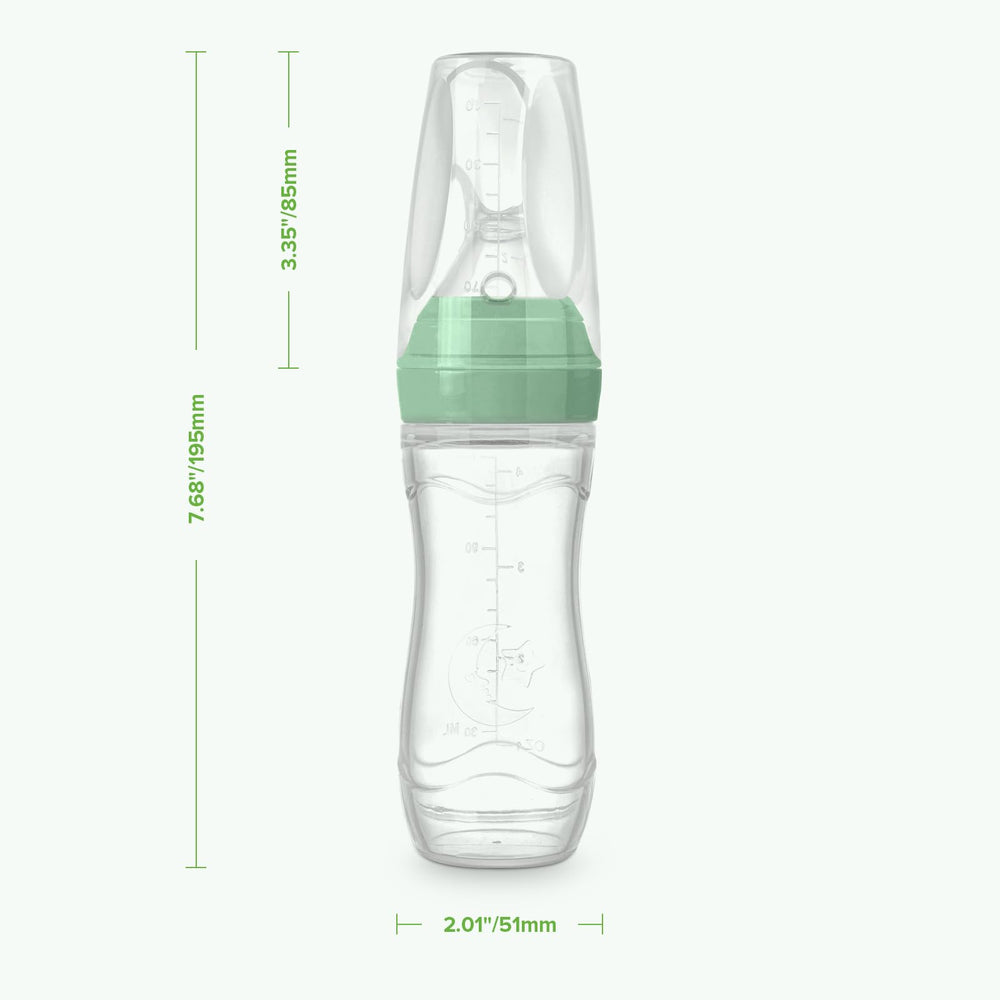 Haakaa pea-green dispenser in use ideal for puree and soft solids