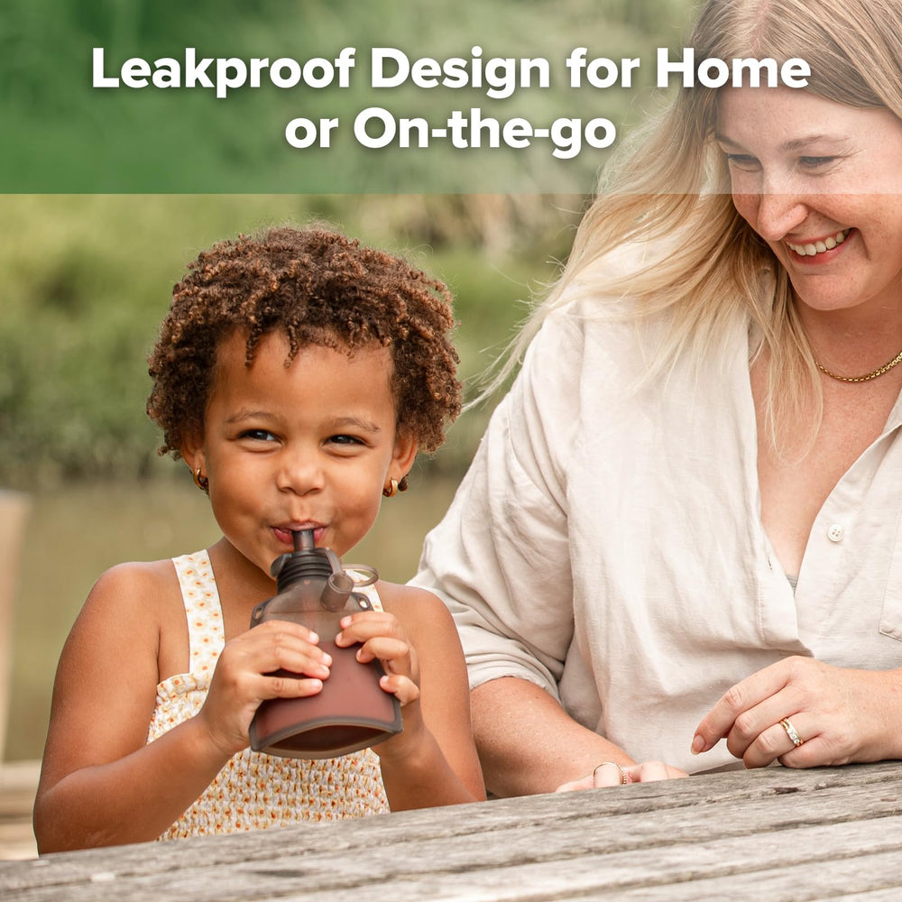 Haakaa silicone spout provides smooth liquid flow for self-feeding.