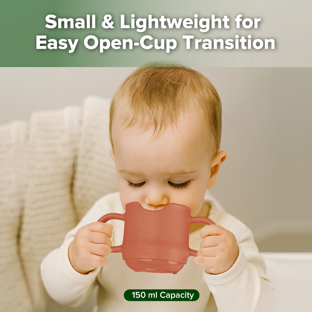 Haakaa cup red with nose cutout to guide upright sipping.