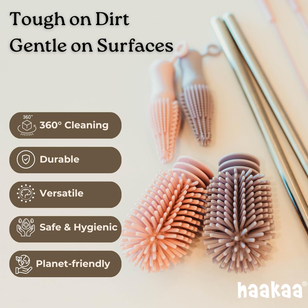 Haakaa Silicone Cleaning Brush Kit angled-tip view; reaches tight corners for deep cleaning.