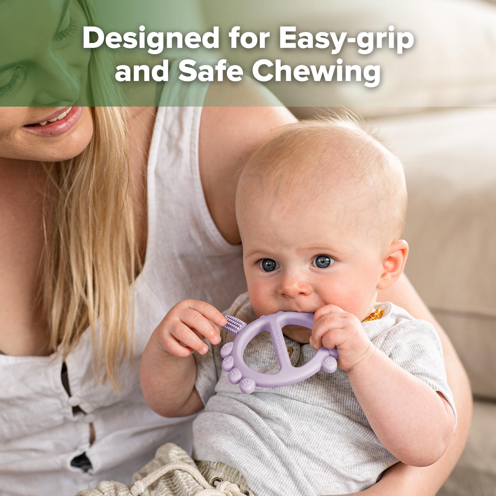 Haakaa teether in-use – easy handle fosters little hands to explore and hold