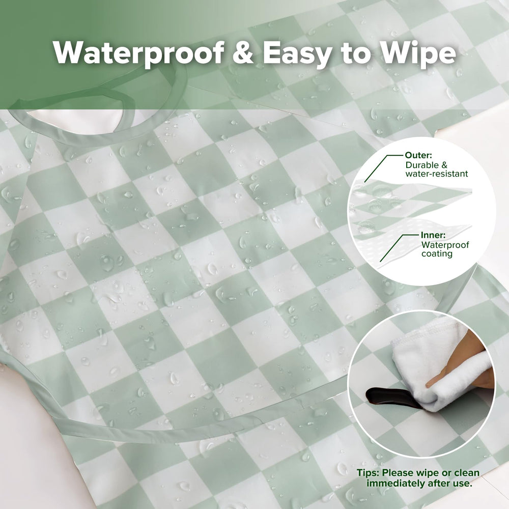 Waterproof wipe-clean fabric protects clothing during meals and activities.