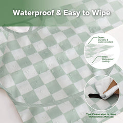 Waterproof wipe-clean fabric protects clothing during meals and activities.