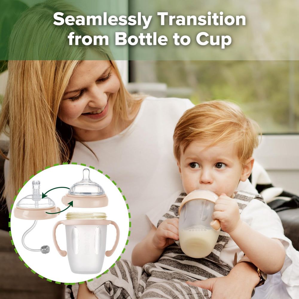 Haakaa peach cup with removable handle supporting growing toddlers' independence.