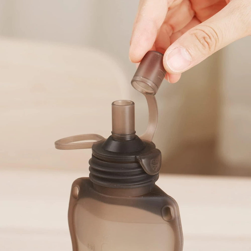 haakaa Yummy Pouch Sippy Spout grey stored in fridge to show sterilizer-friendly use.