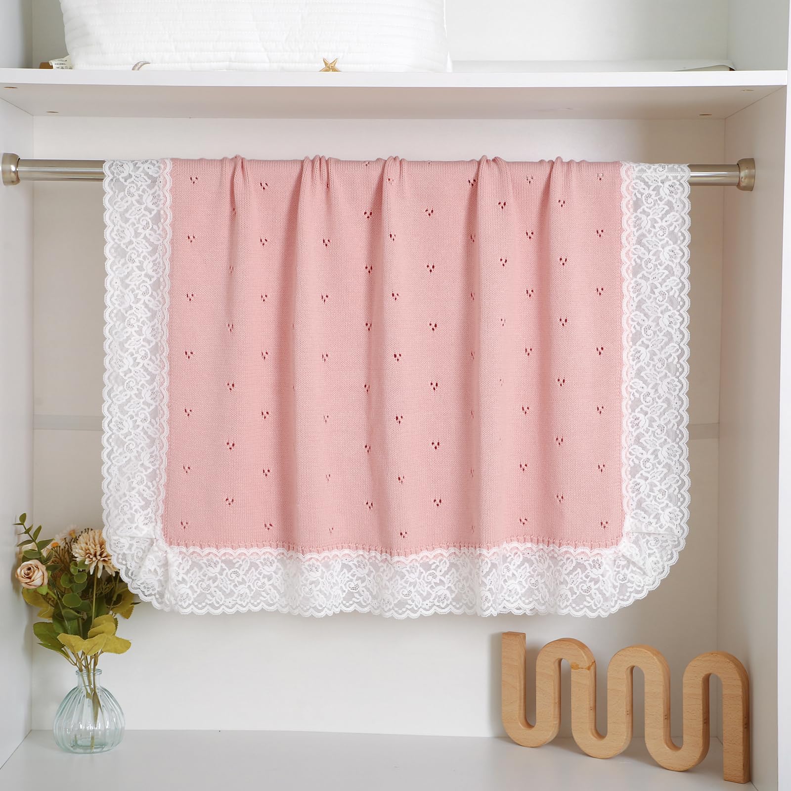 Hadetoto lace knit baby blanket pink being washed to demonstrate easy care