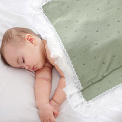 Hadetoto lace pattern baby blanket, light-green detail for nursery decor.
