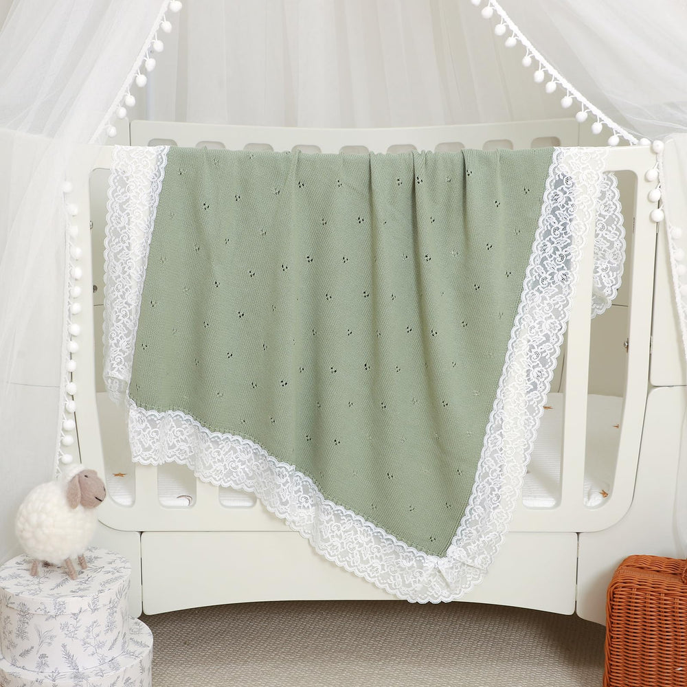 Lightweight Hadetoto baby blanket in light green for year-round coverage.