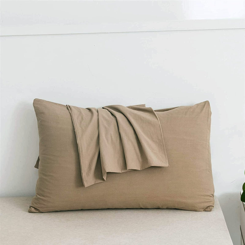 Hadi Bedding taupe pillowcase with zipper secures the pillow inside.