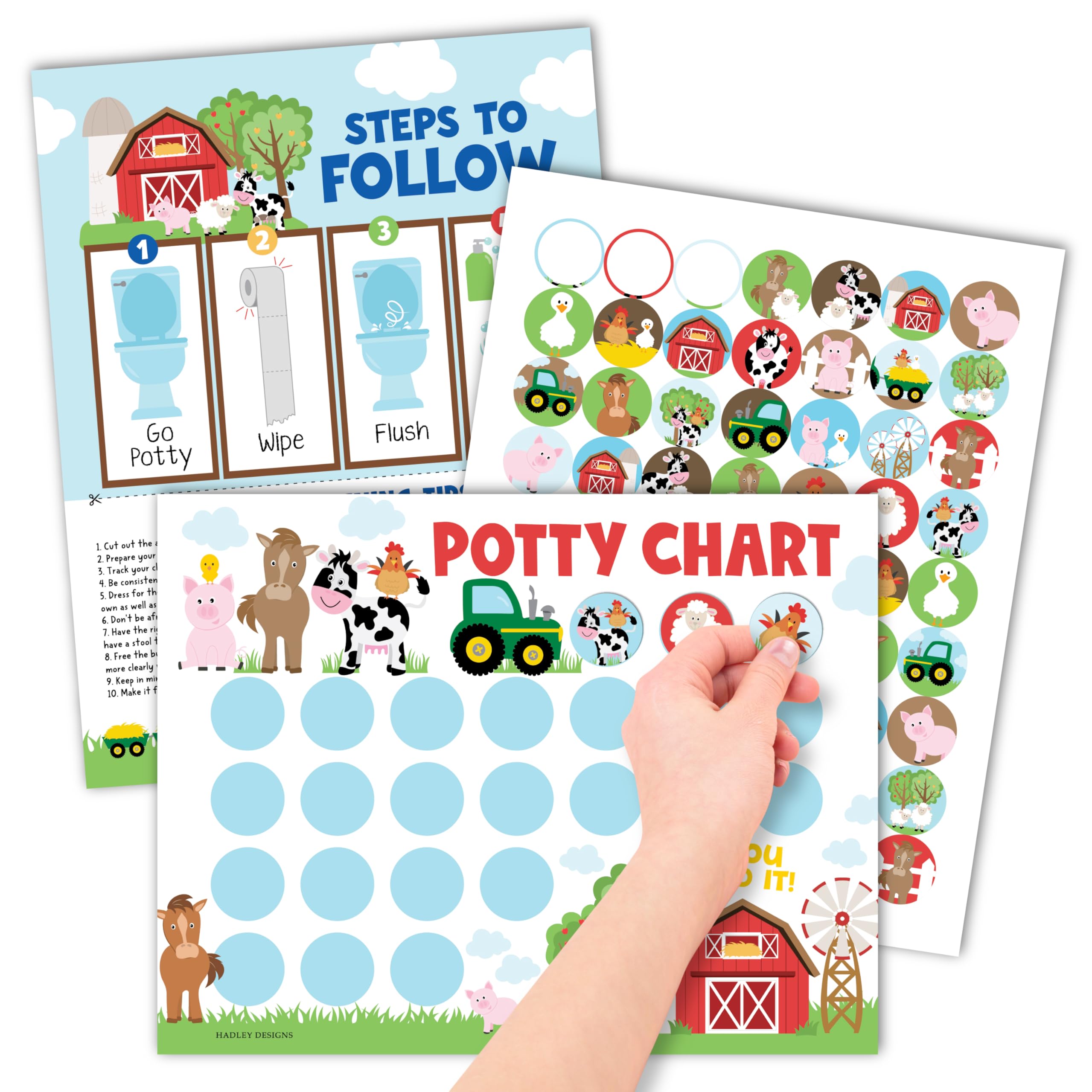 Hadley Designs potty chart flatlay with posters and stickers for easy planning