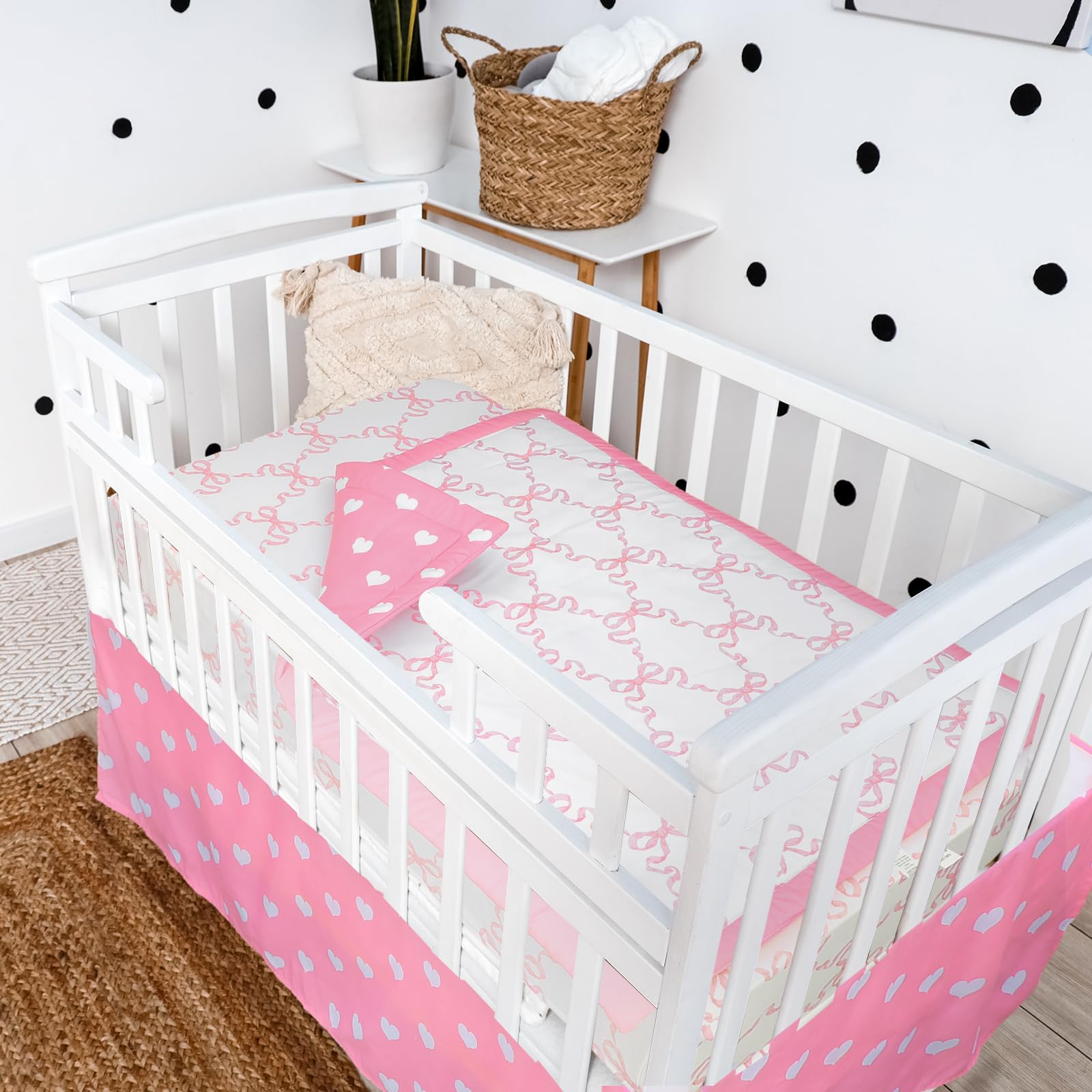 Hahafelt Coquette pink bow set ready for quick changes in nursery