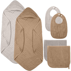 Hahafelt muslin hooded towel in brown keeps baby warm after bath.