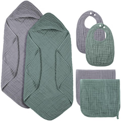 Hahafelt green hooded towel ready for gentle bath warmth and absorption.